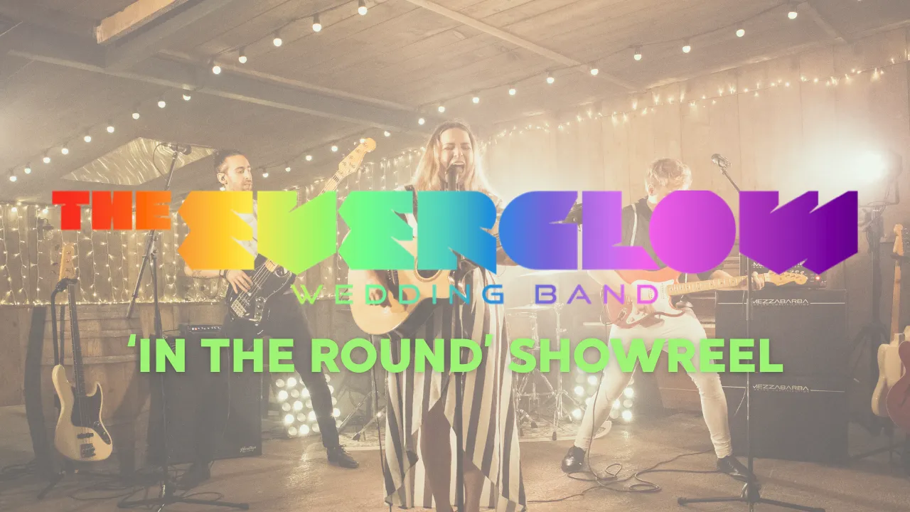 The Everglow wedding band performing live on stage with colorful band name and 'In The Round' showreel text overlay.